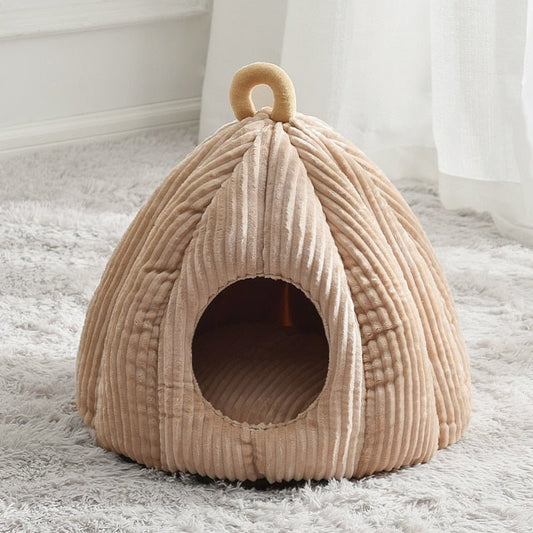 beige color enclosed cat bed in adorable pumpkin design