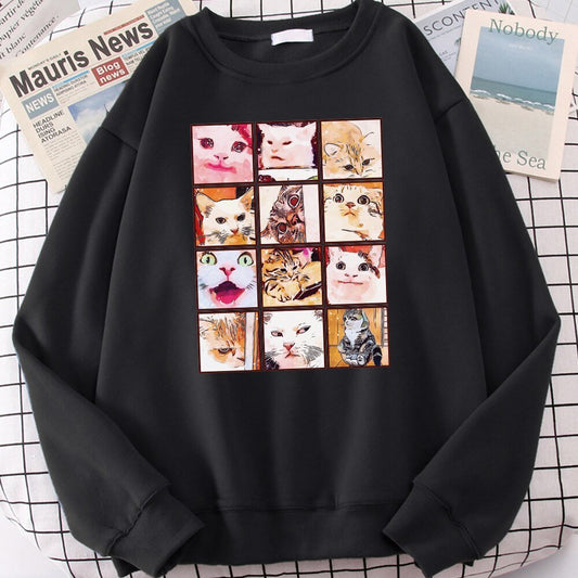 Black 'Cat Memes' sweatshirt displaying multiple cat faces for a fun look