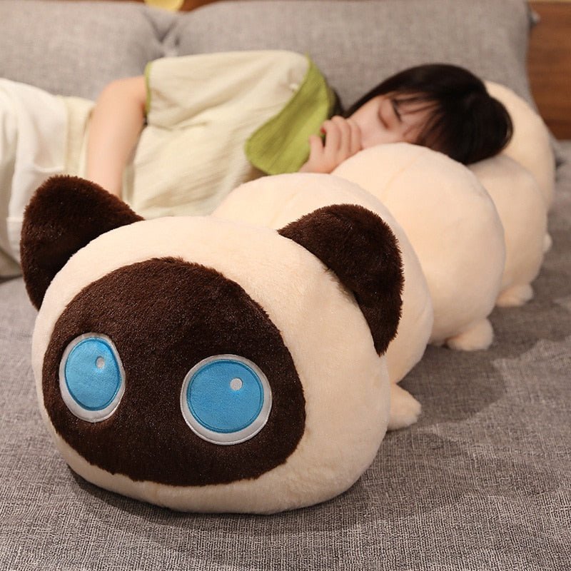 a pillow cat plush  of a cat in caterpillar shape