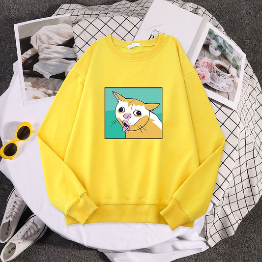 Yellow sweatshirt featuring the iconic coughing cat meme, ideal for cozy, funny vibes