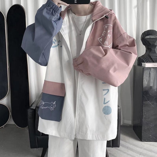 a male wearing a light blue and pink color kawaii look cat jacket for human