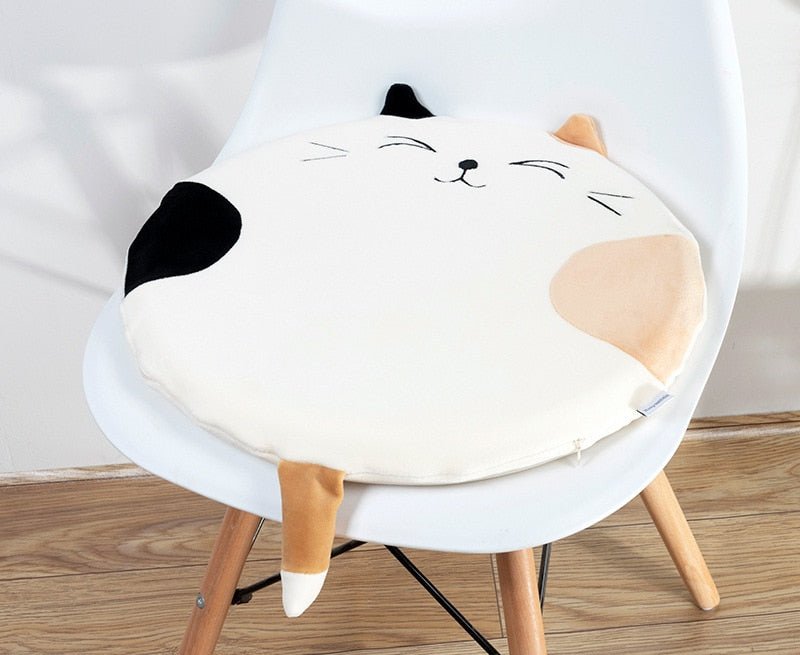 a cute calico cat plush for sitting on a chair