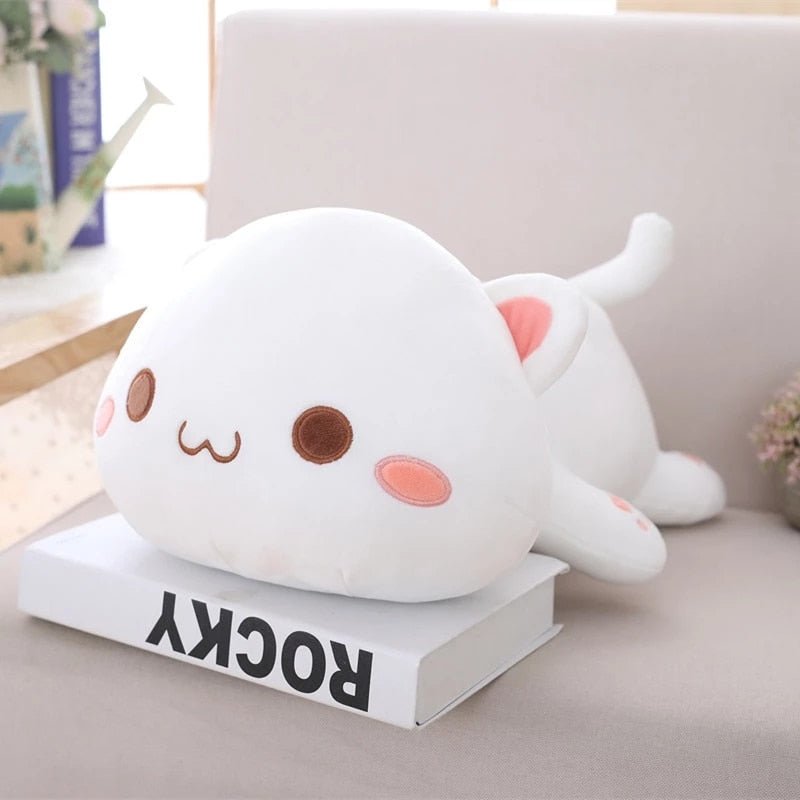 a jumbo cat plush of a white cat laying down