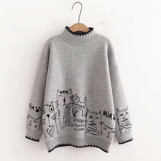 Oversized gray sweater with black cat drawings for a laid-back, stylish look