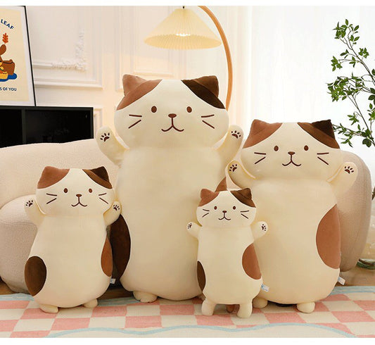 The happiest calico cat plush