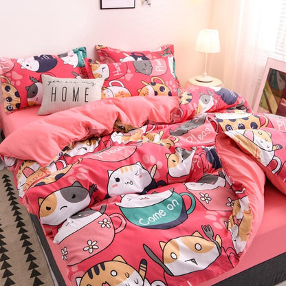 cozy cat comforter made for queen bed with printed cats from different breeds inside mugs that look cute