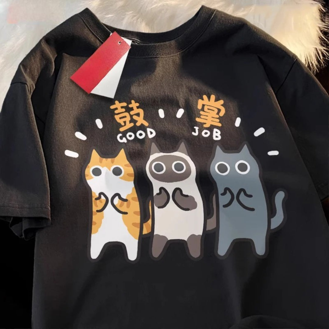 "The Official 'You're Doing Great' Cat T-Shirt in black color with three cats - ginger, siamese and british shorthair