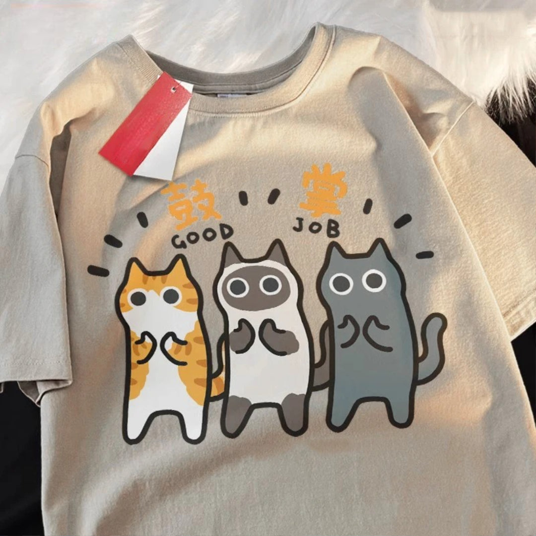 beige color t-shirt with cartoon cats clapping for you together with english and kanji meaning "good job"