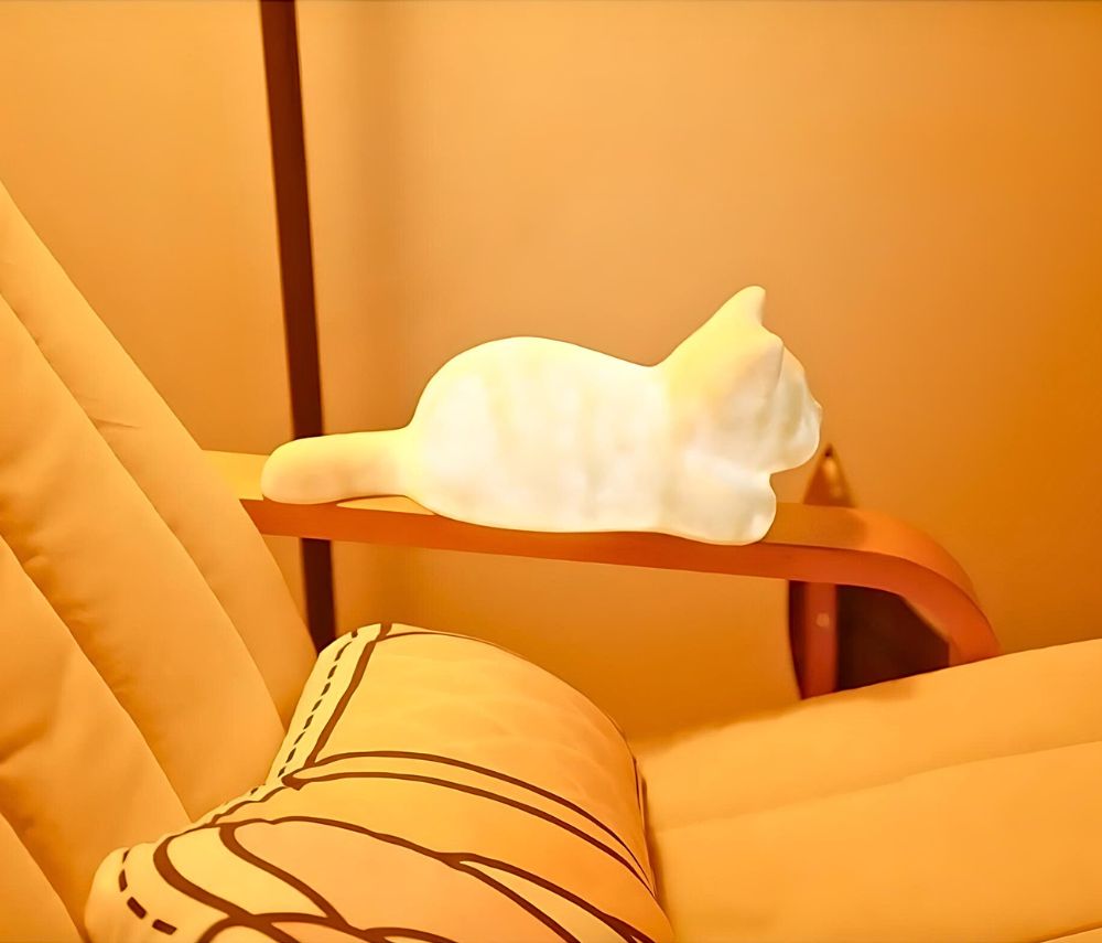 Dreamy 'Loafing Cat Light Lamp' on Bedside chair