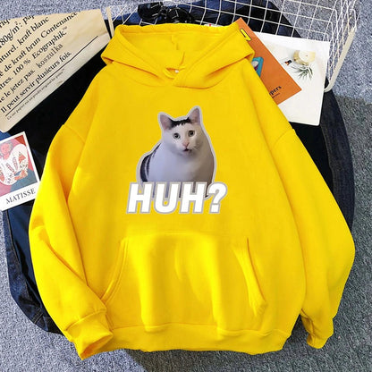 a Funny Hoodie printed with the viral huh cat in stunning yellow displayed