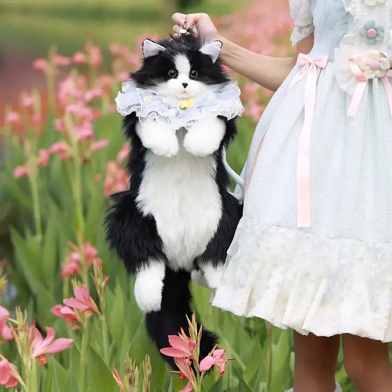 Lifelike Cow Cat backpack with a delicate lace collar, realistic design