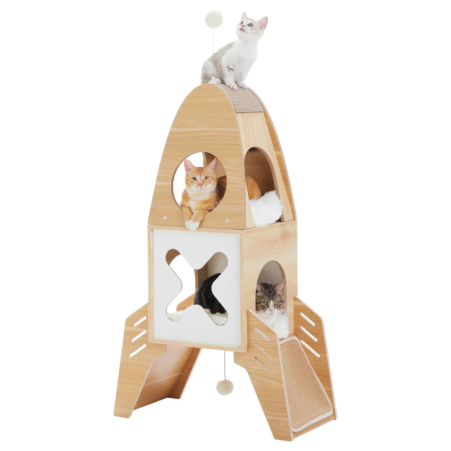 3 cats hanging around the multi level cat tower that has rocket design