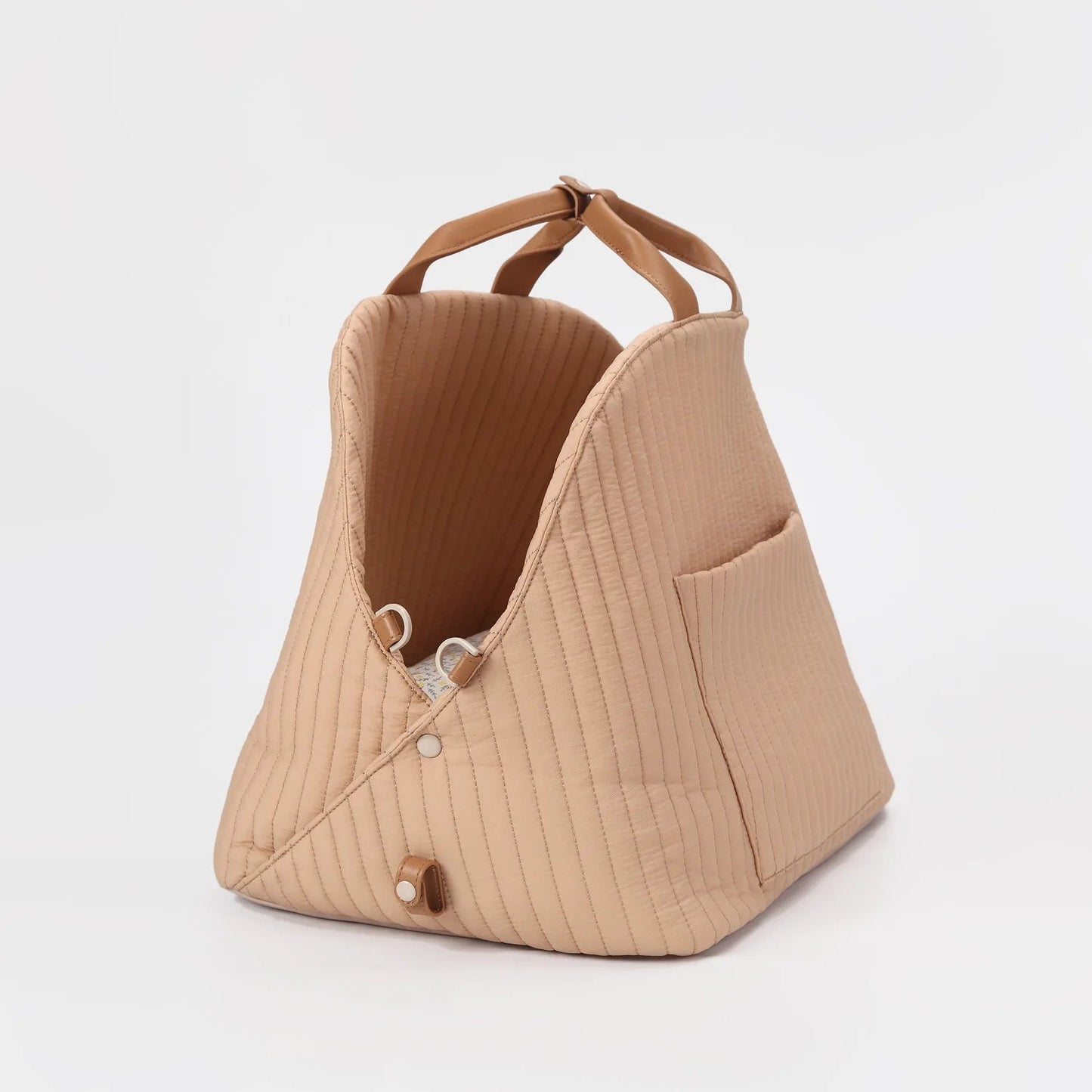 Travel-friendly khaki color luxury cat carrier with elegant PU leather handle and vertical quilting detail