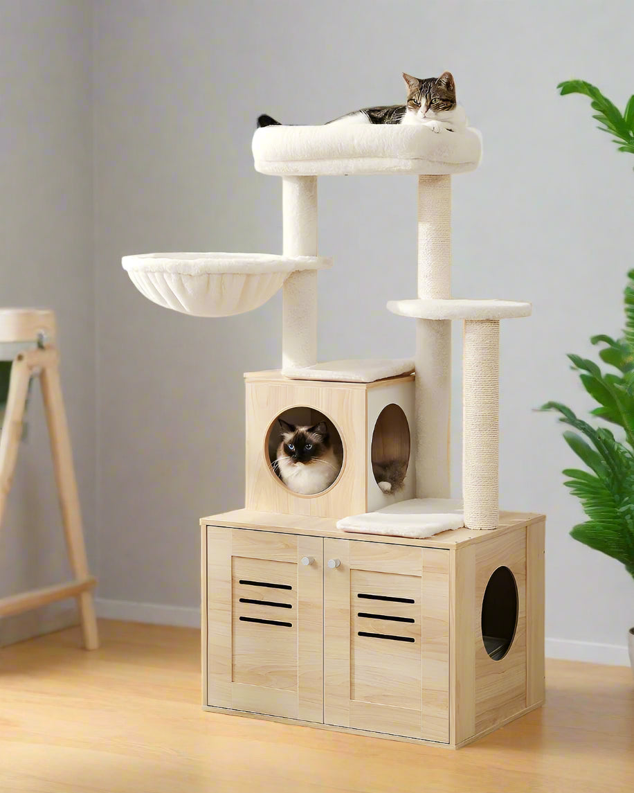 Cat tree with multiple levels and a cat sitting on top in a room.