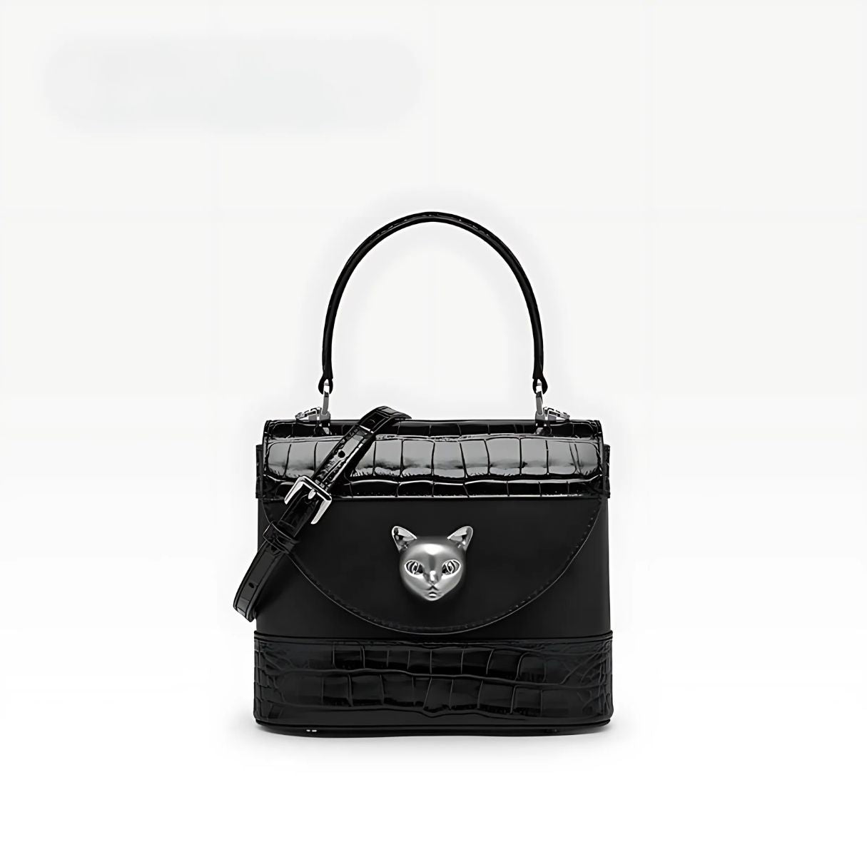 black crocodile leather handbag with silver cat charm in front that looks luxury