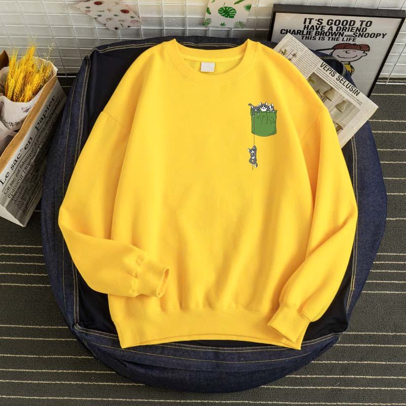 a yellow cute cat sweaters with a printed pocket of cats