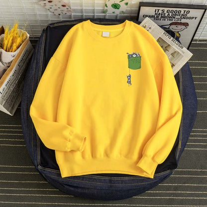 a yellow cute cat sweaters with a printed pocket of cats