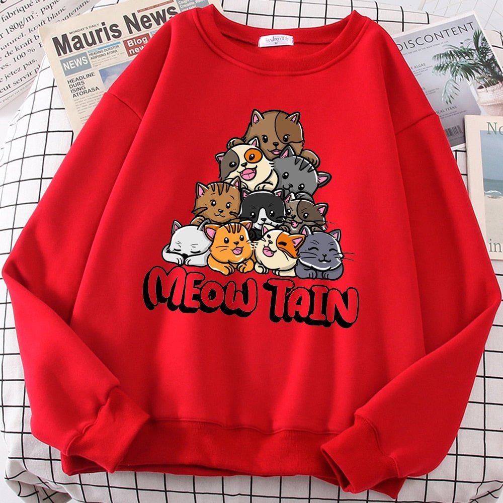 a red color cat sweaters for humans with a mountain of cats design