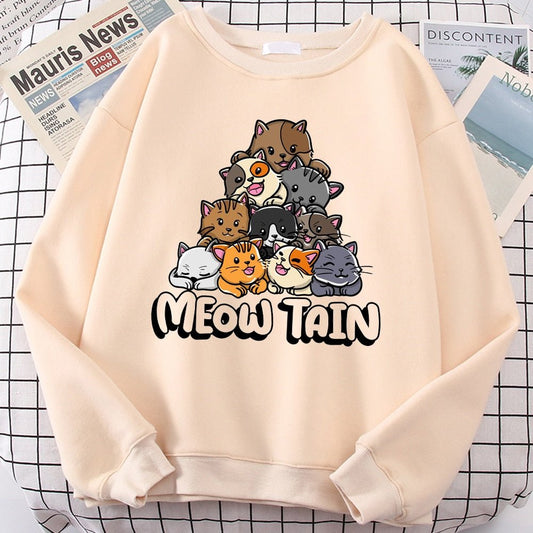 a beige color cat sweatshirts for humans with a mountain of cats design