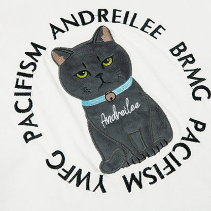embroidery cat design with pacifism words on a mens t shirt