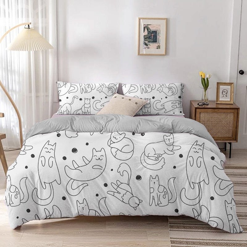 cute comforter set with cat doodle all over it made from soft polyester
