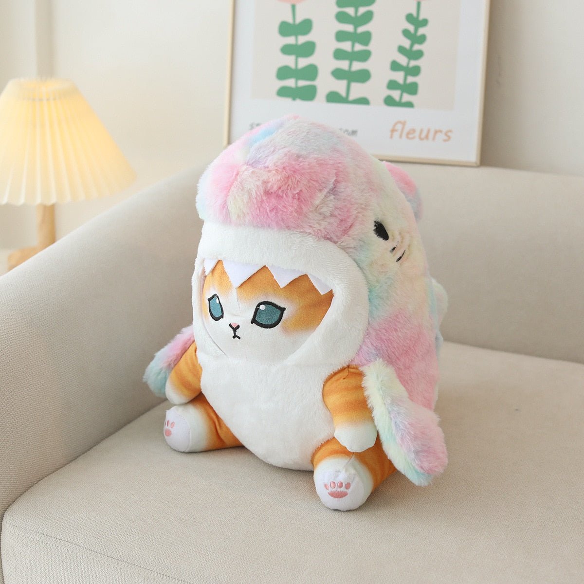 a cute japanese plush of a cat in baby shark dress