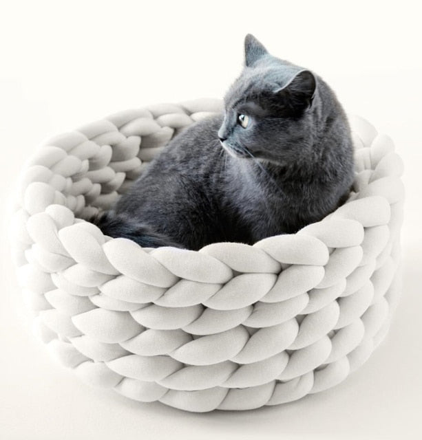 crochet style cat bed in white color to match with scandinavian homes