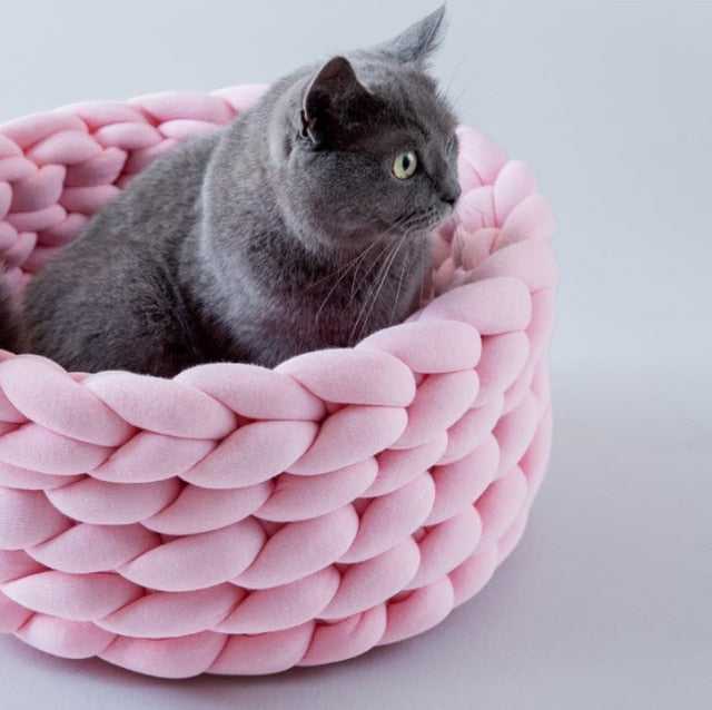 pink color basket made for cats using a soft materials 