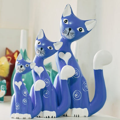 a set of cat sculpture, consisting of dad, mom, and baby, for home decor