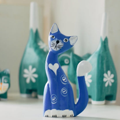 a cat baby figurine in blue color with cute design for home decor