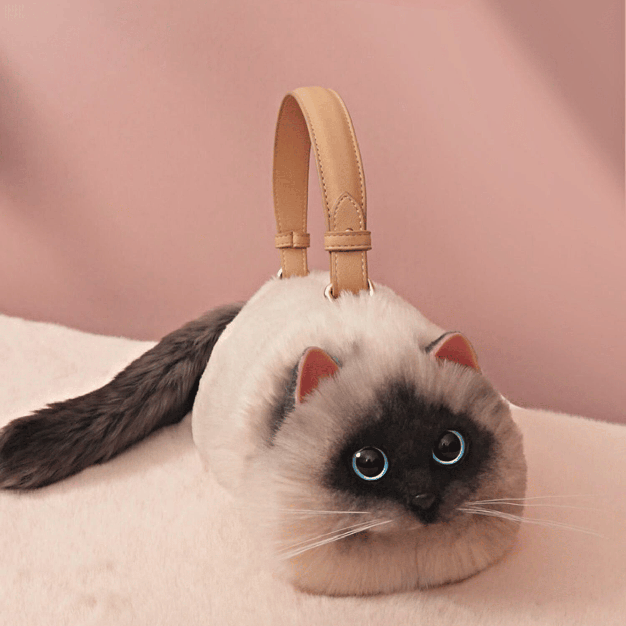 super realistic siamese cat handbag made by meowgicians