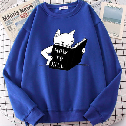 a blue cat sweaters for humans with a cartoon of a cat learning how to kill