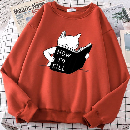 a red color cat sweatshirts for humans with a cartoon of a cat learning how to kill