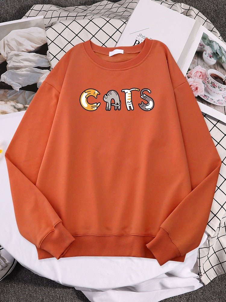 an orange color womens cat sweatshirt with cats letter