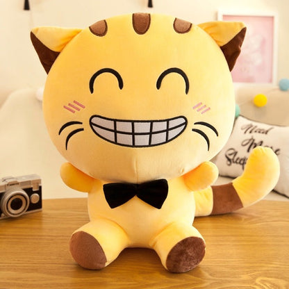 a jumbo cat plush of a cat smiling