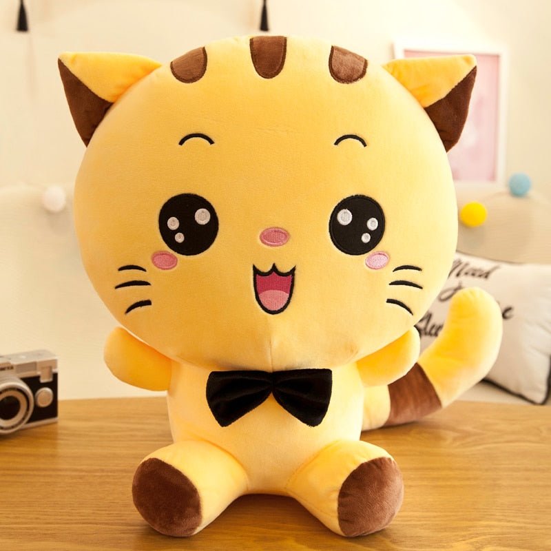 a japanese plush of a cat smiling