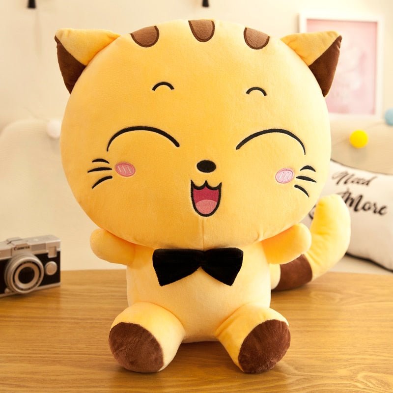 a japanese cute plushies of a cat smiling