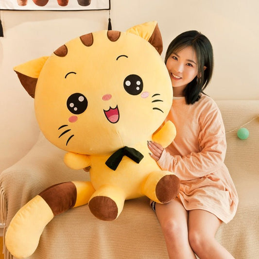 a lady holding a big cat plush of a cute cat