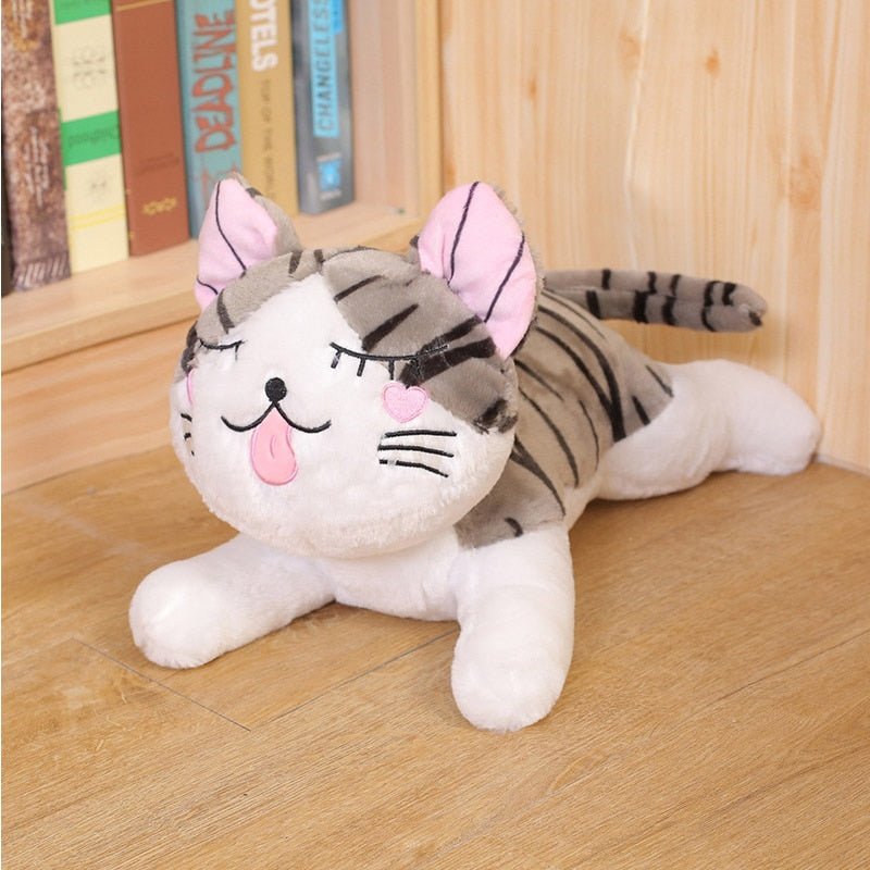 a pillow cat plush of a tabby cat