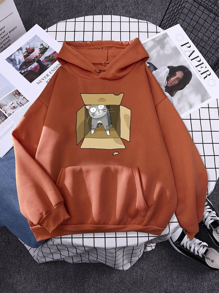 hoodie in brown color with a funny and cute picture of a cat playing hide and seek in a box