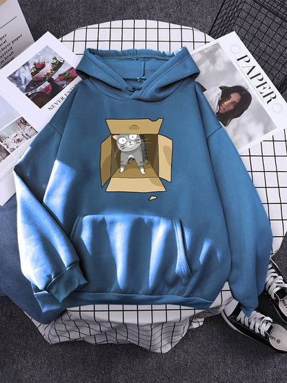 haze blue color cat hoodie that comes with a pouch featuring a grey cat hiding under a box