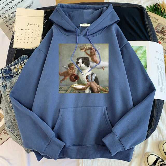 haze blue cat hoodie made for cat dads with funny picture of a cat getting a special treatment by three cupids