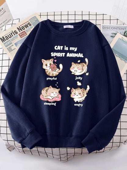 a navy blue sweatshirt with cat cartoons design
