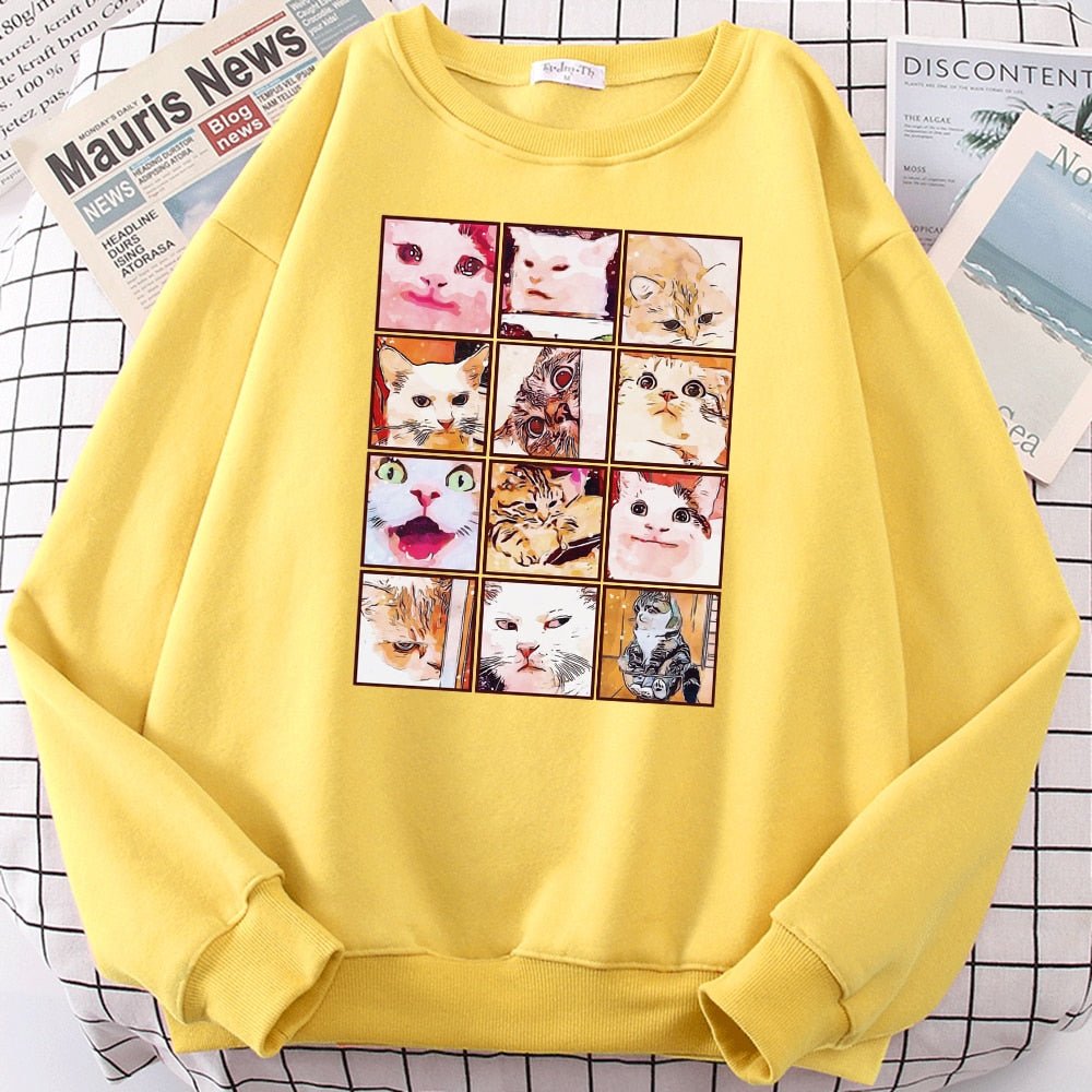 a yellow cat themed sweatshirts featuring famous memes