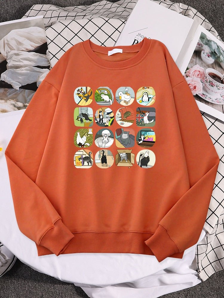 an orange cat lover sweatshirt with multiple cat memes on it