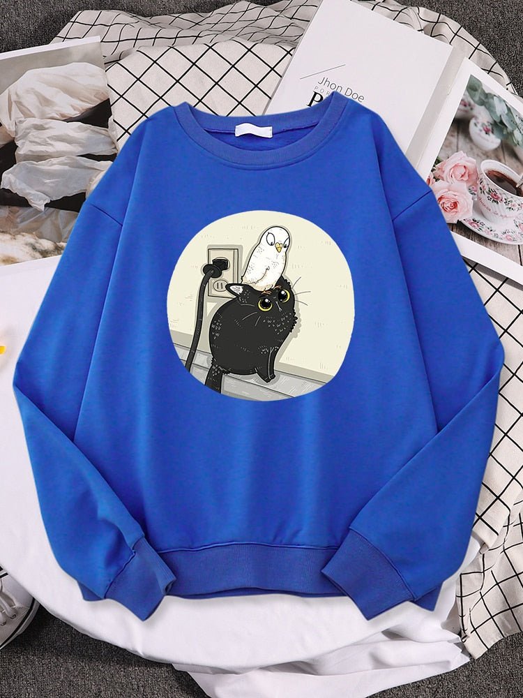 a blue cute cat print sweater with a picture of a pigeon on a cat