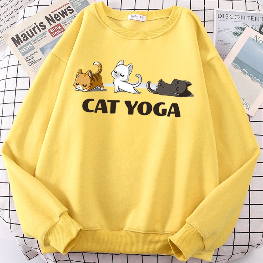 a yellow color girl cat sweatshirt with pictures of cats doing yoga