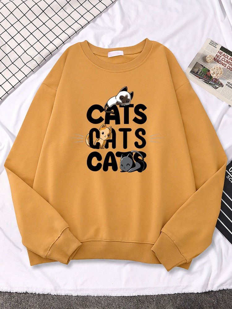 an orange womens cat sweatshirt with pictures of 3 cute cats