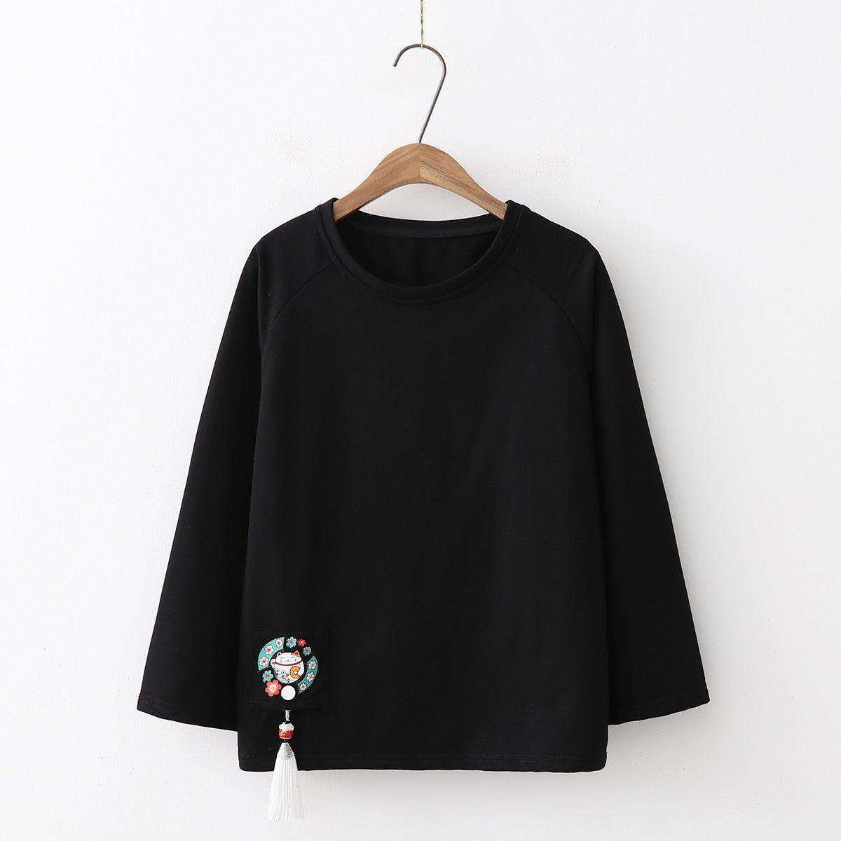 a black long sleeves cat sweater for woman made from high quality cotton