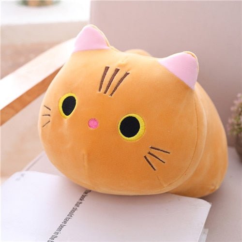 a cute plushie cat in orange color